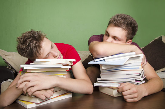 Two Kids Feel Asleep From To Much Homework