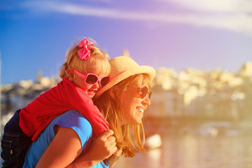 mother and daughter playing on the quay of Valetta, Malta