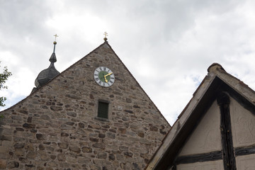 Fototapeta na wymiar clock on the wall of a church