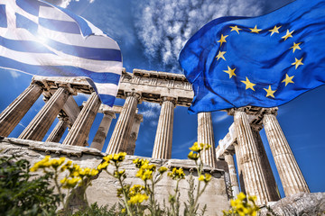 Acropolis with flag of Greece and flag of European Union in Athens, Greece