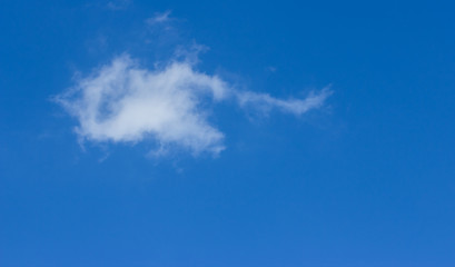 White single cloud in the blue sky