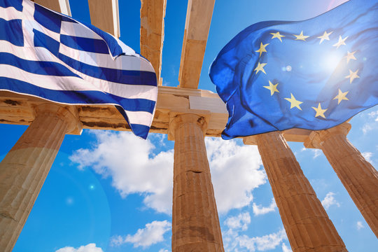 Acropolis with flag of Greece and flag of European Union in Athens, Greece