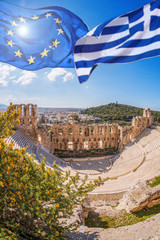 Acropolis with flag of Greece and flag of European Union in Athens, Greece