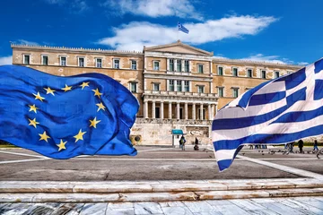 Foto op Canvas Greek Parliament with flag of Greece and flag of European Union in Athens © Tomas Marek