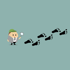 Vector of Cartoon of a detective, following the footprints
