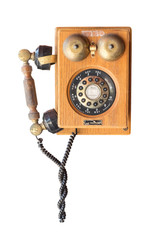 Old wood vintage telephone isolated on white background