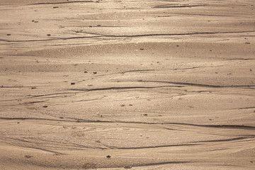 Fototapeta na wymiar Natural sand patterns in beach
