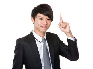 Businessman with finger show up