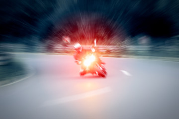 Motorcyclist is taking a corner at high speed