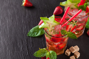 Mojito drinks on black stone