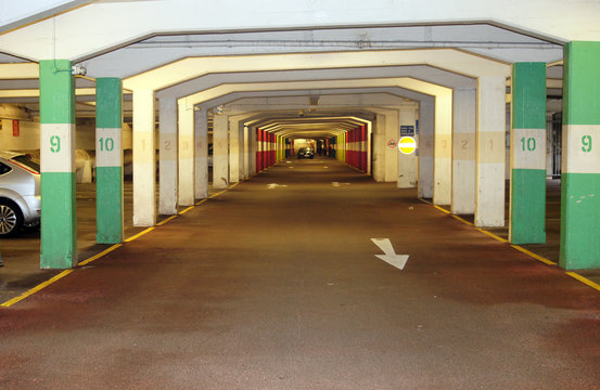 Basement car parking with the numbers on the pillars