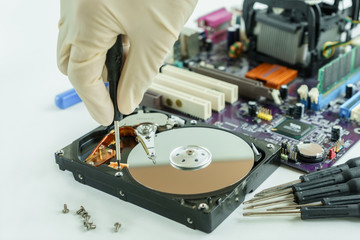 Obraz premium Remove screw from Hard Disk Drive