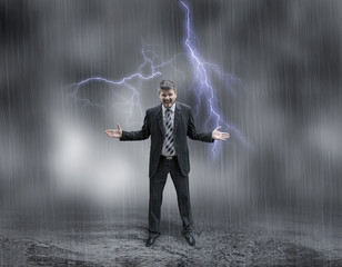 Angry Businessman with Storm Clouds and Lightning Strikes Background