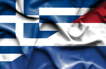 Waving flag of Netherlands and Greece