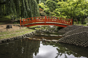 Wonderful wooden bridge in beautiful Albert Kahn Park. Paris