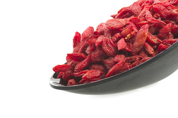 Bowl with Group of Goji berry on the white