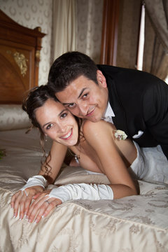 Lovely and young wedding couple happy to be together