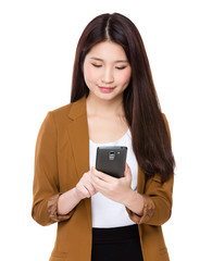 Fototapeta premium Young businesswoman use of the smartphone