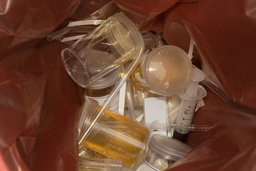 medical waste in the trash bin