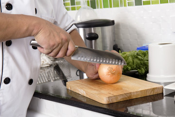 Chef cutting onion for making Hamburger