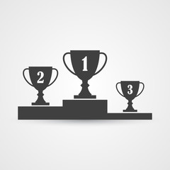 Podium with trophy cups