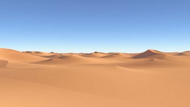 Flying over the desert dunes and sand