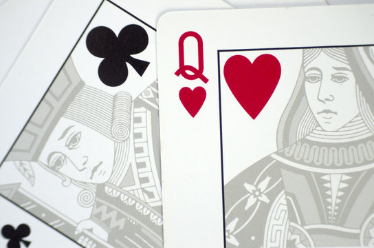 Closeup of classic playing cards with love separation concept massage.