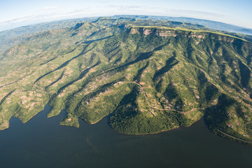 Aerial flying Inanda Valley hills valleys dam landscape outside Durban