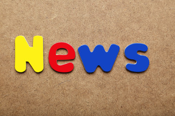 News word made of colorful magnets
