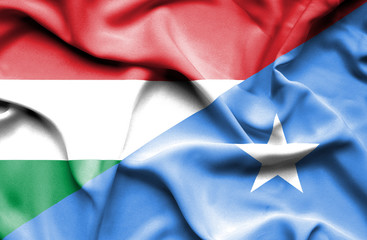 Waving flag of Somalia and Hungary