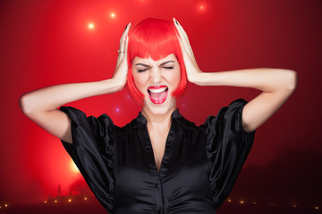 Portrait of a beautiful young woman outdoors