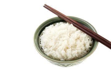 Rice on green Bowl with wood chopsticks isolated on white background
