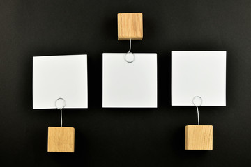 Opposite Opinion, three paper notes on black background for pres