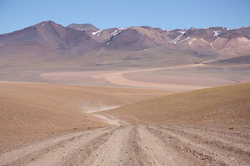 Fototapeta na wymiar Empty road in Atacama Desert in Bolivia, South America