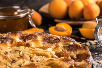Homemade apricot tart with almonds and fresh fruits