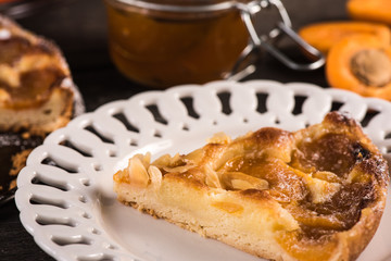 Homemade apricot tart with almonds and fresh fruits
