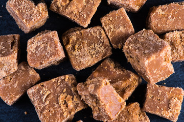 Traditional homemade fudge toffee, cut in squares cubes