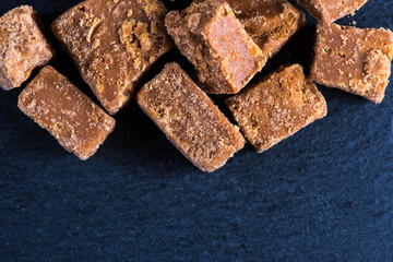 Traditional homemade fudge toffee, cut in squares cubes