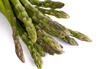 Asparagus shot at an angle on a white background and close-up