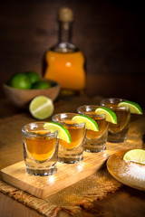 Fine art photo of alcohol liquor tequila and shot glasses