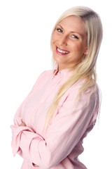 Cute woman in her 20s wearing a pink shirt, arms crossed
