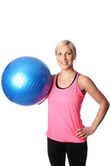 Attractive blonde woman working out in a pink shirt