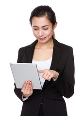 Asian Businesswoman use of the digital tablet pc