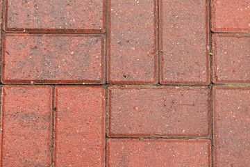 Wet red brick patio