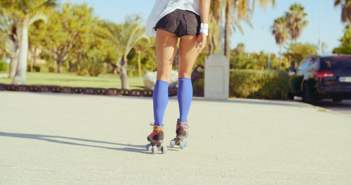 Sexy Back of Roller Skate Girl