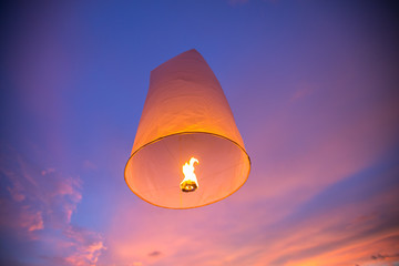 Floating lanterns in the evening sky