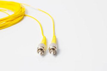 Close up of a fiber optic patchcord on white background