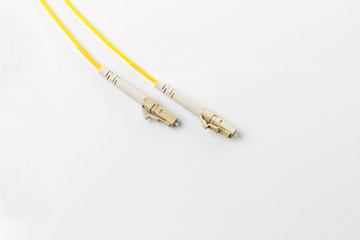 Fototapeta premium Close up of a fiber optic patchcord on white background