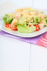 Caesar salad in a white plate