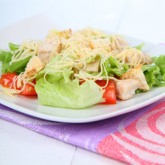 Caesar salad in a white plate